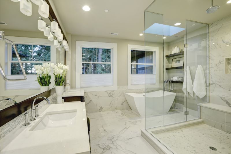 Luxurious bathroom with soaking tub and marble accents