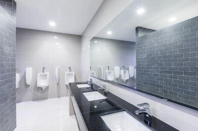 Renovation of a residential bathroom with natural stone finishes